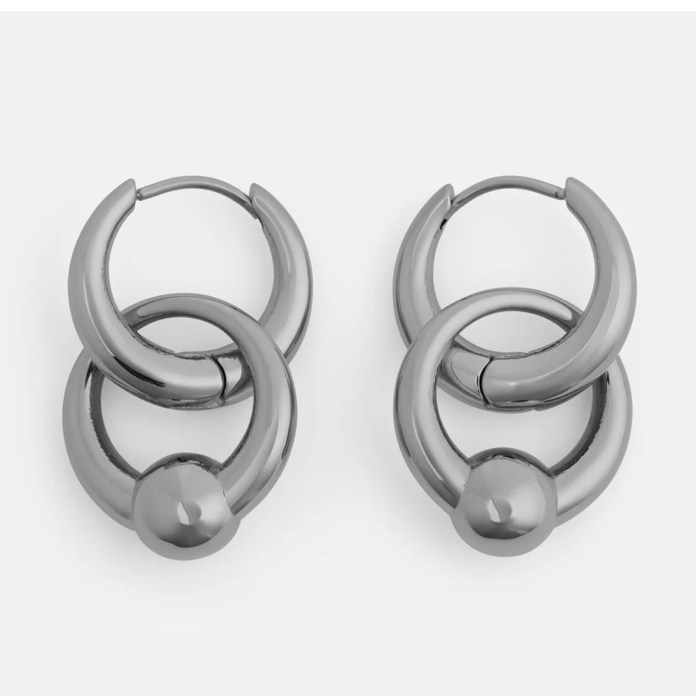 Thrash earring set features dangling hoops inspired by vintage punk aesthetics